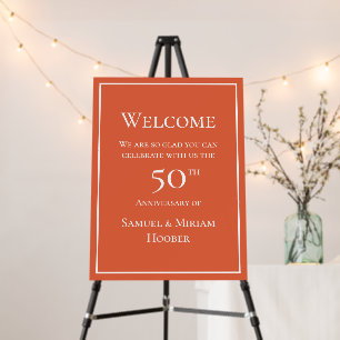 Orange 50th wedding anniversary party welcome sign