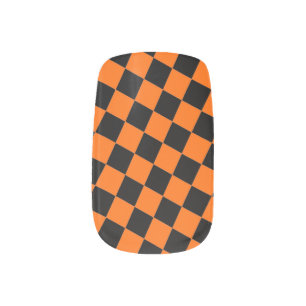 Orange and black check pattern minx nail art