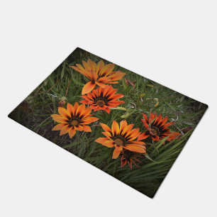 Orange and Black Gazanias Door Mat
