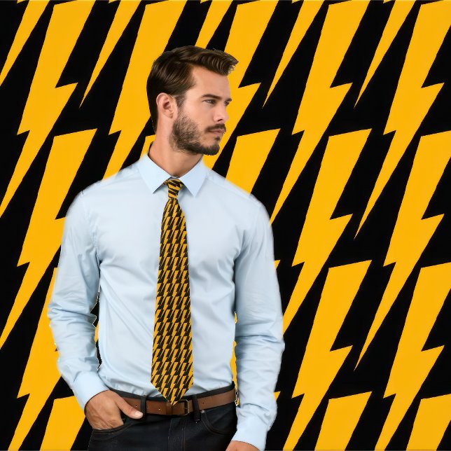 Orange and Black Lightning Bolt Necktie (Man wears a necktie with orange lightning bolts  pattern on black. 
)
