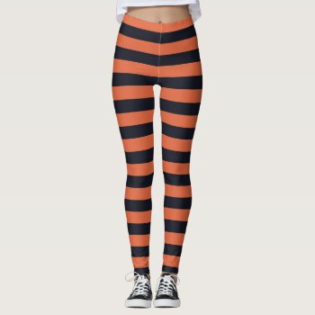 Orange And Black Striped Leggings by HolidayFun at Zazzle