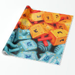 Orange and Blue Dreidels Wrapping Paper<br><div class="desc">Photo of colorful orange and blue dreidels. Image by Adiel lo,  wikicommons.</div>
