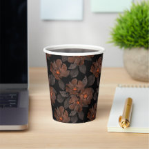 Orange and brown flowers on a black background.