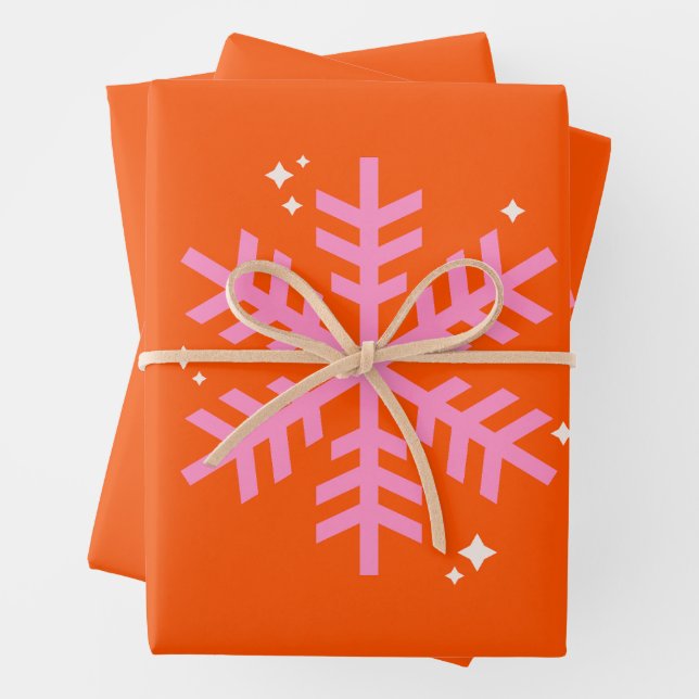 Orange and Pink Holiday Snowflake Christmas Wrapping Paper Sheets (In situ)