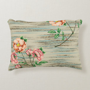 Orange and pink vintage flowers with green leaves accent pillow