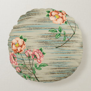 Orange and pink vintage flowers with green leaves round pillow