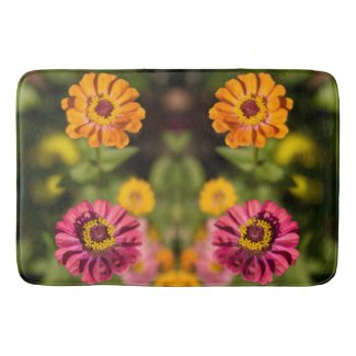 Orange and pink zinnias in blossom