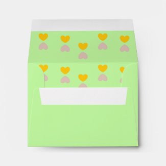 Orange and purple hearts on green