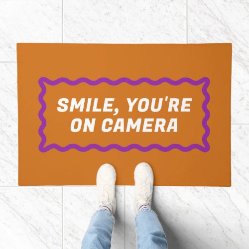 Orange and Purple Wavy Frame Youre on Camera Doormat