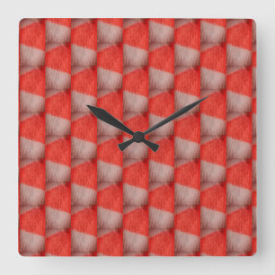 orange and white checkered square wall clock