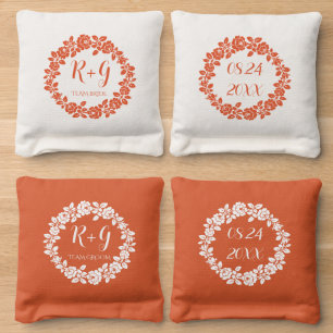 Orange and white rose wreath and initials wedding cornhole bags