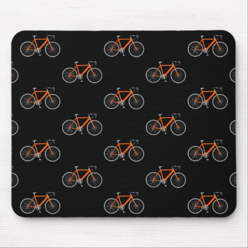 orange bicycle on black mouse pad