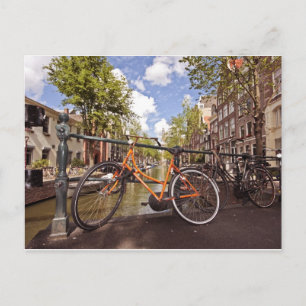 Orange bike in Amsterdam Netherlands Postcard