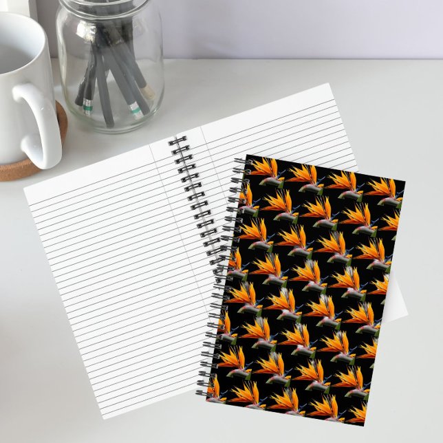 Orange Bird of Paradise Plant Pattern on Black Notebook (In Situ)