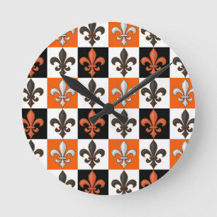 Orange Black White Checkered Fleur-de-lis Design Round Clock