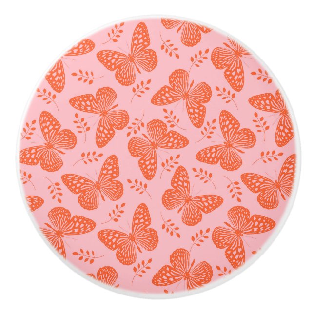 Orange butterfly pattern on pink background ceramic knob (Front)
