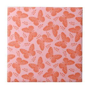 Orange butterfly pattern on pink background ceramic tile