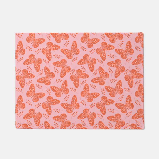 Orange butterfly pattern on pink background doormat (Front)