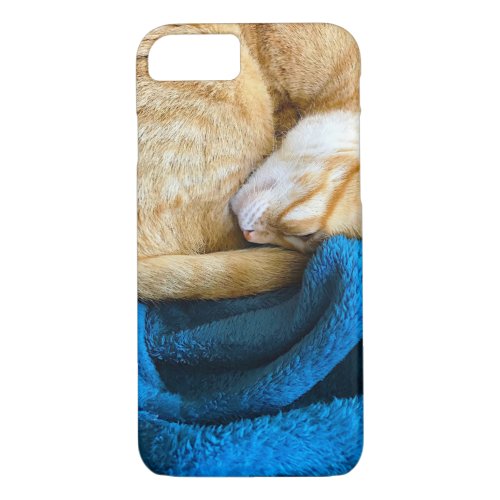 Orange cat curled up on blanket iPhone 87 case