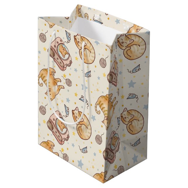 Orange Cat in a Backpack, Stars, and Yarn Medium Gift Bag (Back Angled)