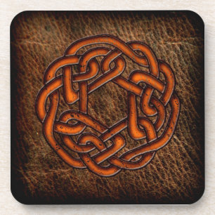 Orange celtic knot on leather beverage coaster