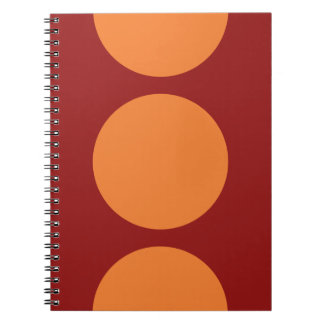 Orange Circles on Red Notebook