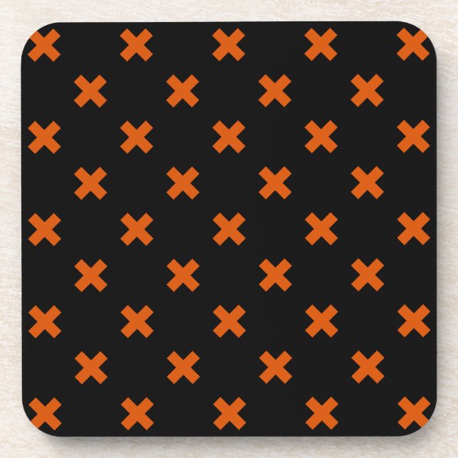 Orange cross stitches on black beverage coaster (Front)