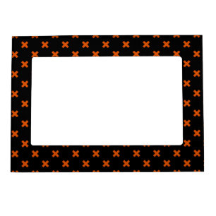 Orange cross stitches on black magnetic frame
