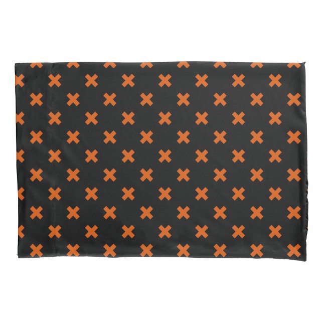 Orange cross stitches on black pillow case (Front)
