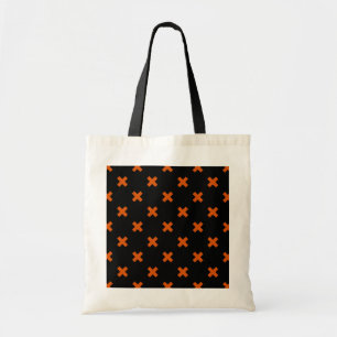 Orange cross stitches on black tote bag