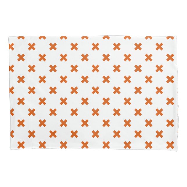 Orange cross stitches on white pillow case (Front)