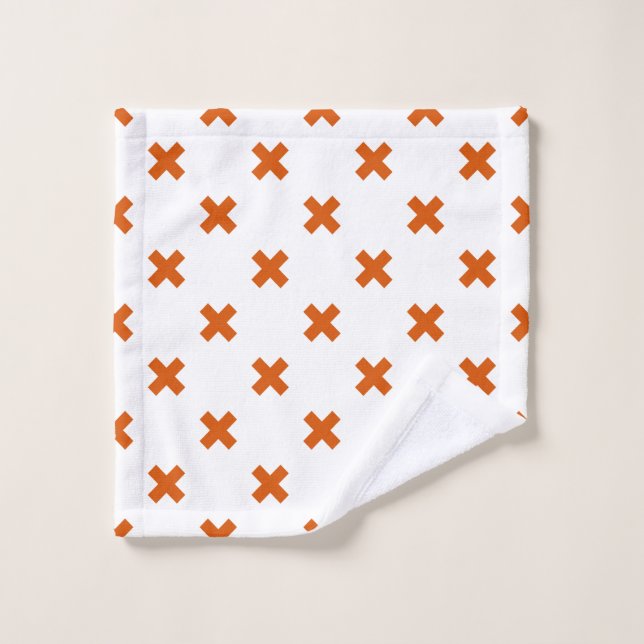 Orange cross stitches on white wash cloth (Wash Cloth)