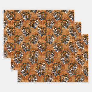 Orange Floral Skeleton Hands on Orange Wrapping Paper Sheets