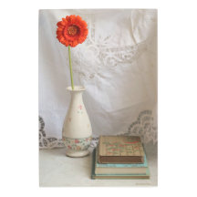 Orange gerbera and books 