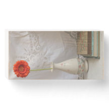 Orange gerbera and books 