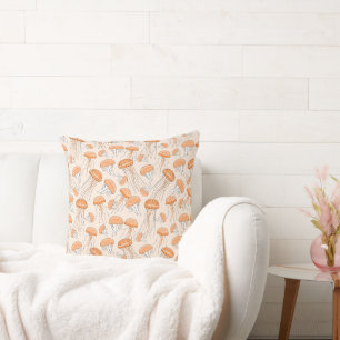 Orange glowing jelly fish pattern throw pillow
