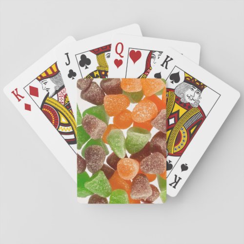 Orange green red gum candy sprinkled with sugar poker cards