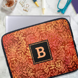 Orange leaf pattern monogram modern bold botanical laptop sleeve<br><div class="desc">A sparkly gold and copper foil ombre autumn leaf pattern on a rich burnt orange and deep red textured background adorns this modern, trendy neoprene laptop sleeve. Customize this elegant sleeve with your monogram initial. Makes a chic and stylish statement every time you use it. This laptop sleeve comes in...</div>