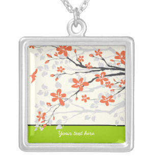 Orange lime green magnolia flowers silver pendant