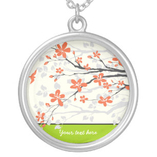 Orange lime green magnolia flowers silver pendant