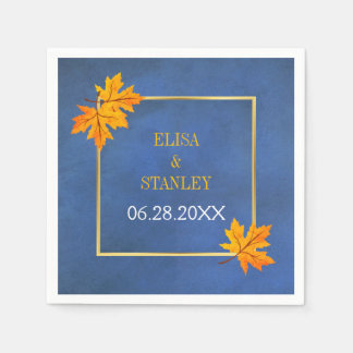 Orange maple leaves on blue rustic wedding napkins