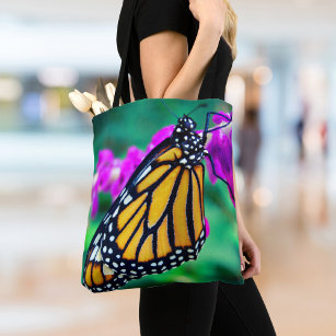Orange monarch butterfly photo purple flower chic tote bag