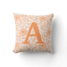 Orange monogrammed pillow