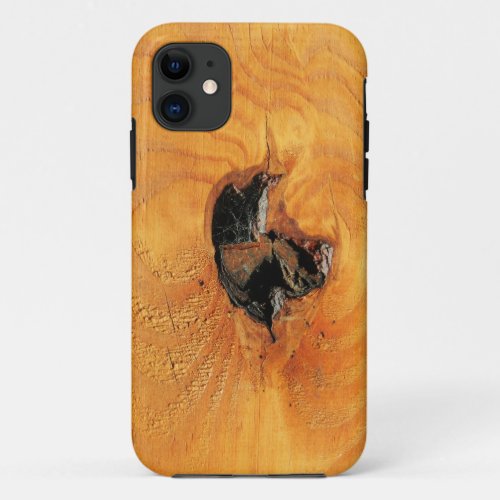 Orange natural wood with black hole and spiderweb iPhone 11 case