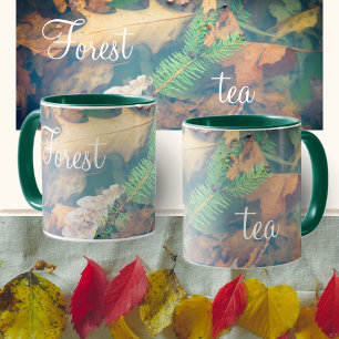Orange oak leaves under the water mug