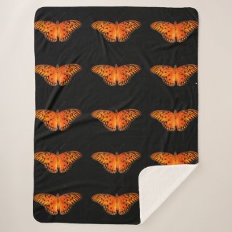 Orange passion butterflies on dark