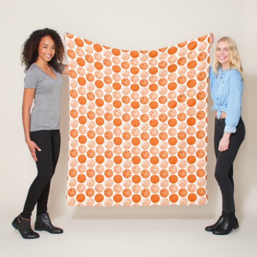 Orange Pickleball Balls on White Fleece Blanket