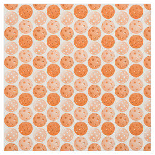 Orange Pickleballs on White Fabric