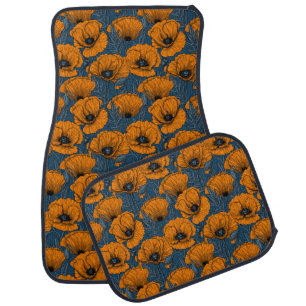 Orange poppies on dark blue car floor mat