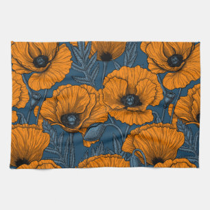 Orange poppies on dark blue kitchen towel
